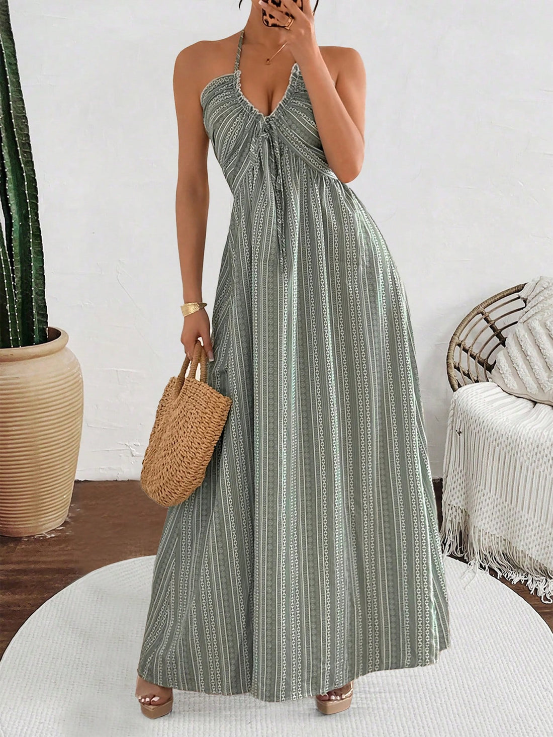 Unleash your inner beach babe with our Elegant Ditsy Floral Mid-Length Dress! Featuring a playful halter neck and flirty side slit, this dress is perfect for vacation and beach attire. With its eye-catching floral print, you'll be turning heads wherever you go. Embrace your fun and flirty side with this must-have dress!