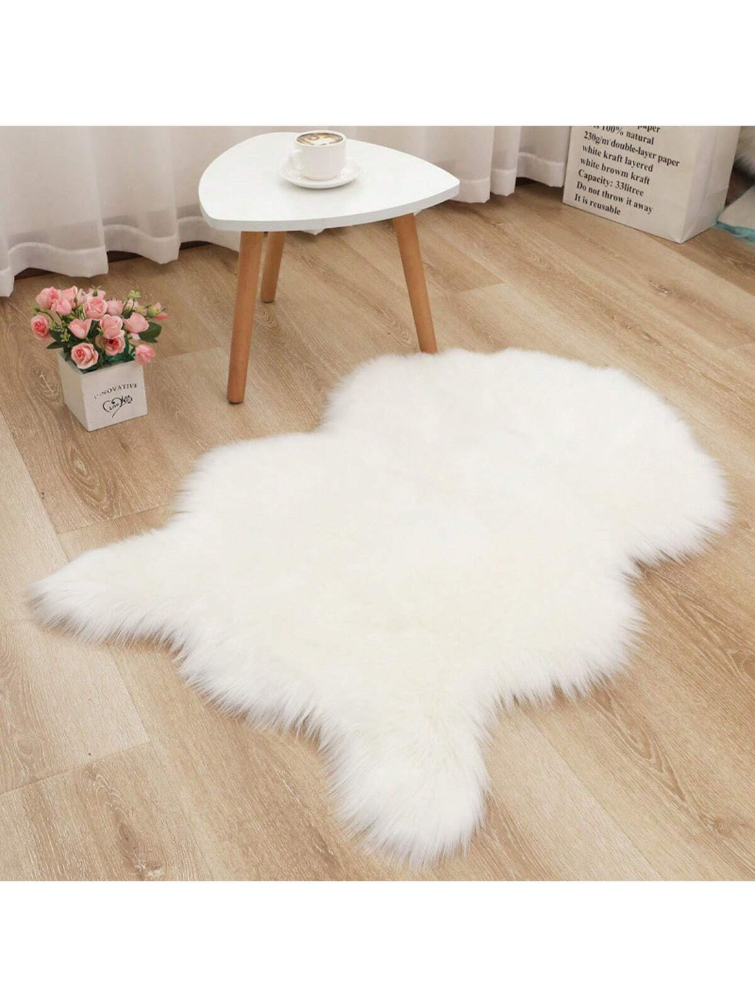 Add a touch of elegance to your living room or bedroom with this modern solid color area rug. Its unique double fish-shaped design makes it a perfect decorative addition, while its soft and durable material provides comfort and functionality. Bring a sense of style and luxury to any space with this versatile rug.