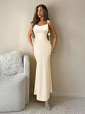 Stunning dusty pink maxi dress designed for unforgettable moments. The backless silhouette creates an alluring, sophisticated look, while the bodycon fit flatters your curves beautifully. Intricate 3D floral embellishments add dimensional elegance and visual interest throughout. Perfect for weddings, galas, proms, or any special occasion where you want to make a graceful impression. The flowing maxi length offers timeless glamour with modern edge.