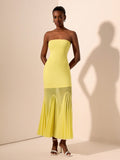 Turn heads in this playful yellow strapless mermaid maxi dress, designed to dazzle all night long. Featuring a unique knit texture and sheer mesh accents, it perfectly blends elegance with an edgy vibe. The figure-hugging silhouette flatters your curves while the vibrant yellow hue adds a burst of sunshine to your evening look. Ideal for making unforgettable entrances and sparkling under the lights.