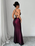 Dress to impress with the Elegant Elenzga V-Neck Lace Backless Mermaid Bodycon Maxi Dress. The intricate lace and backless design add a touch of elegance, while the mermaid silhouette flatters your figure. Perfect for any special occasion, this dress will make you stand out from the crowd.