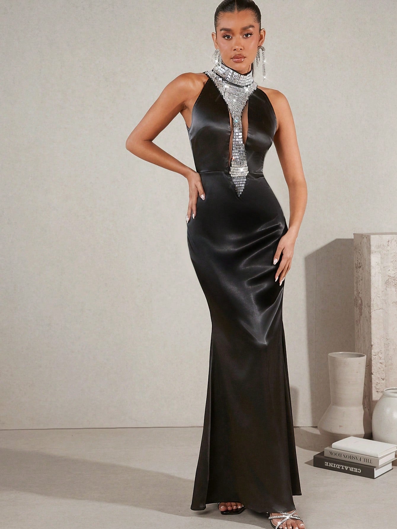 Turn heads with this Elegant Embellished Mock Neck Satin Dress, where silky smooth fabric meets sparkling details for a look that’s effortlessly chic. The high neckline adds a touch of drama while the delicate embellishments bring just the right amount of sparkle. Perfect for evenings when you want to play it cool yet stunningly sophisticated. Dance, dazzle, and delight in a dress that knows how to make an entrance!