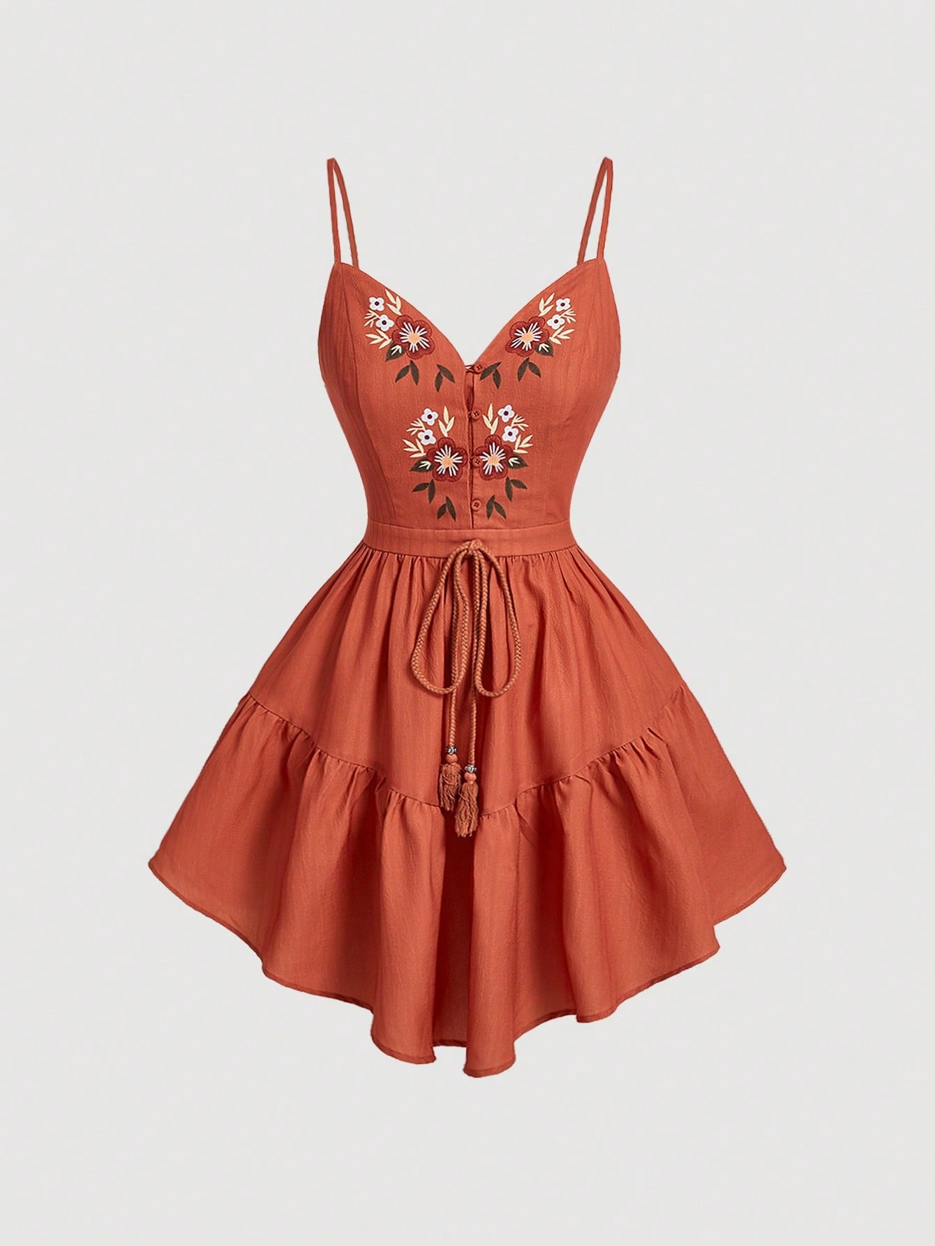 Get ready to turn heads in this Elegant Embroidered Spaghetti Strap Dress! Featuring a stunning Botanical Design, this dress combines sophistication with natural beauty. The delicate embroidery adds a touch of elegance while the spaghetti straps show off your playful side. Perfect for any occasion!