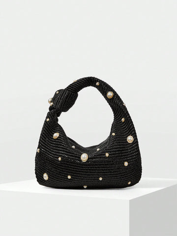 Add a touch of whimsy to your outfit with this Elegant Faux Pearl Embellished Top Handle Bag. Its charming pearl details bring a playful sparkle, while the sturdy top handle keeps your essentials close and stylish. Perfect for turning heads and brightening any look!