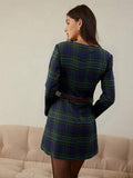 Rear three-quarter view of navy tartan fit-and-flare mini dress with concealed back zipper