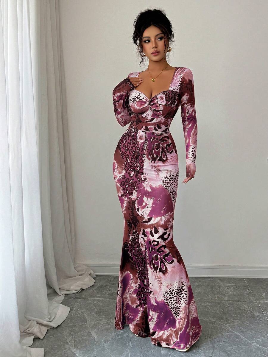 Elegant Fitted Leopard Print Fishtail Dress with Twist Front Detail and Long Sleeves Elegant Fitted Leopard Print Fishtail Dress with Twist Front Detail and Long Sleeves
