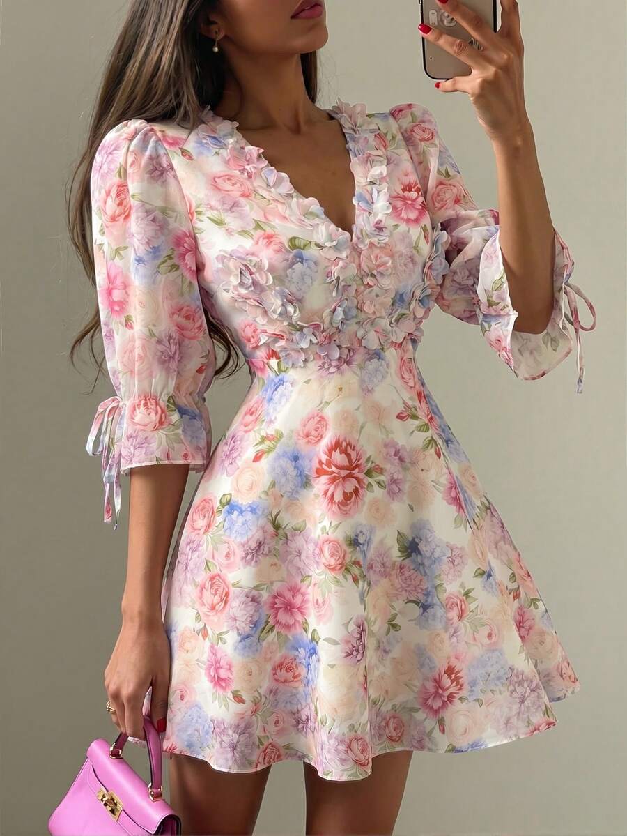 Front view of pastel floral V neck puff sleeve mini dress showing visible color, print, and silhouette