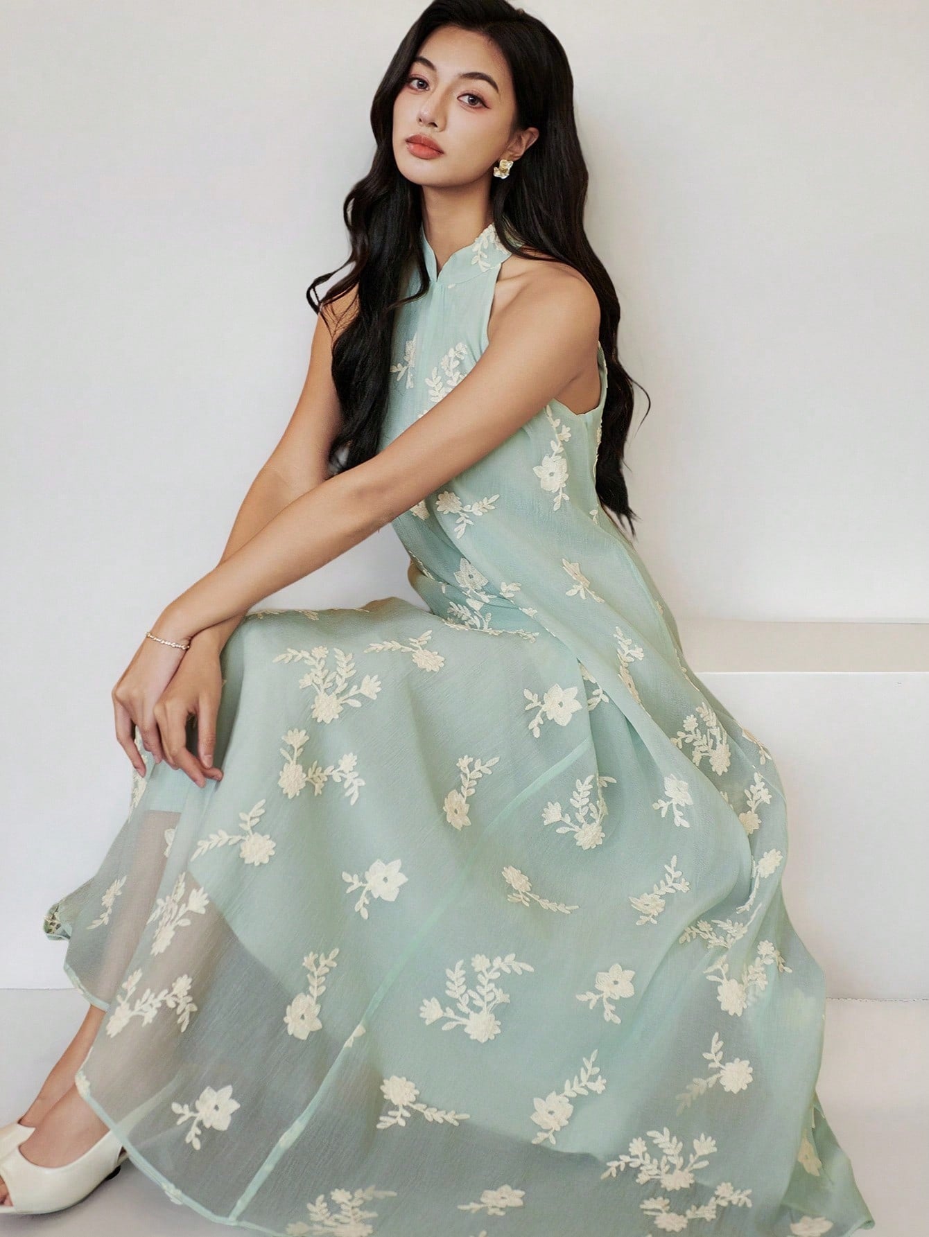 This sleeveless summer dress brings the party with its gorgeous floral embroidery! Perfect for graduation celebrations or casual warm-weather adventures, it's the outfit that says "I woke up like this" while secretly being your fashion MVP. Slip it on and watch heads turn as you float through summer days with effortless style and a dash of elegance.