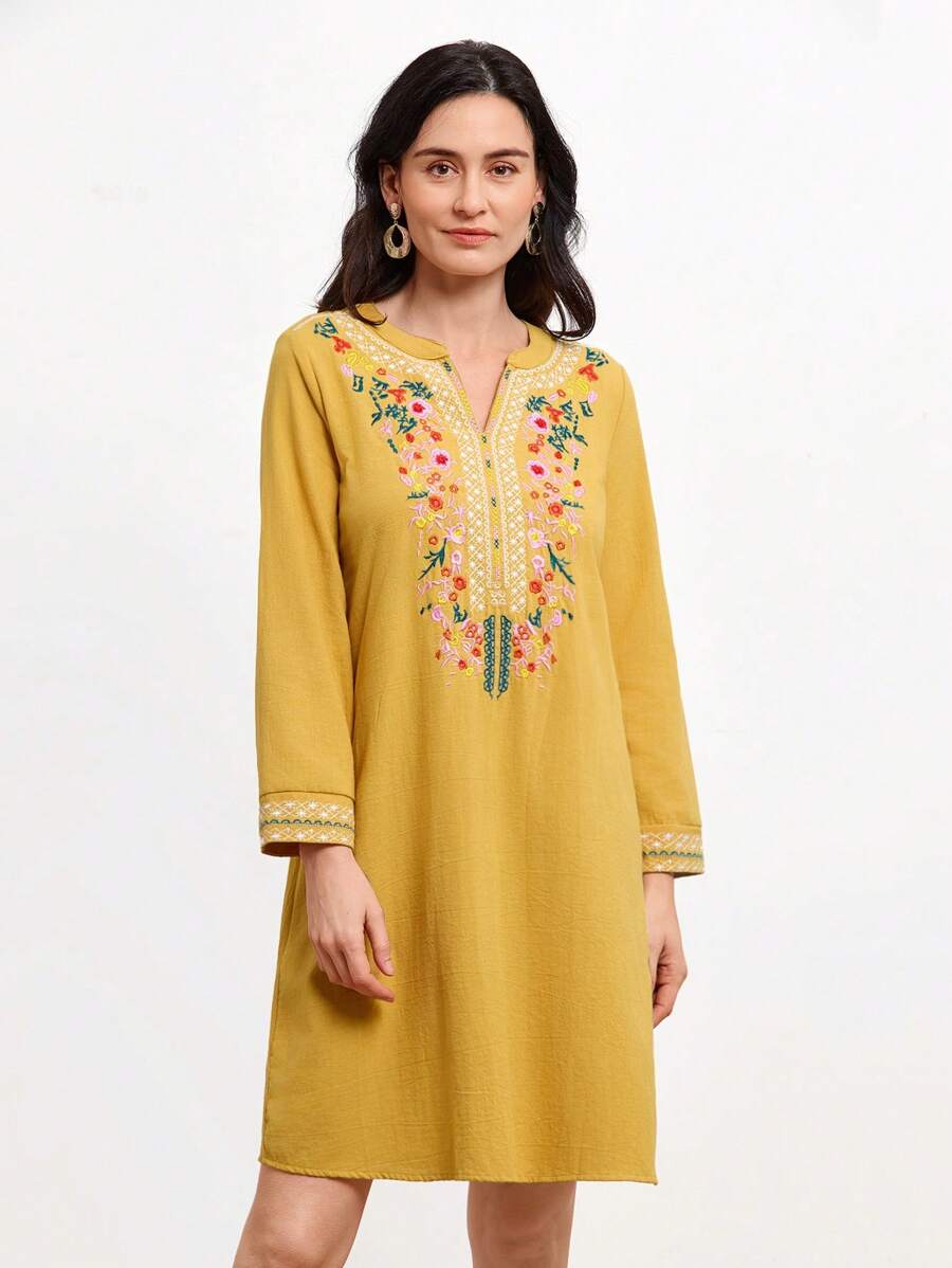 Get ready to turn heads with this elegant dress featuring delicate floral embroidery and a unique notched neckline. Perfect for any occasion, this dress is the epitome of effortless style. Dress to impress in this stunning piece that is sure to make you stand out from the crowd!