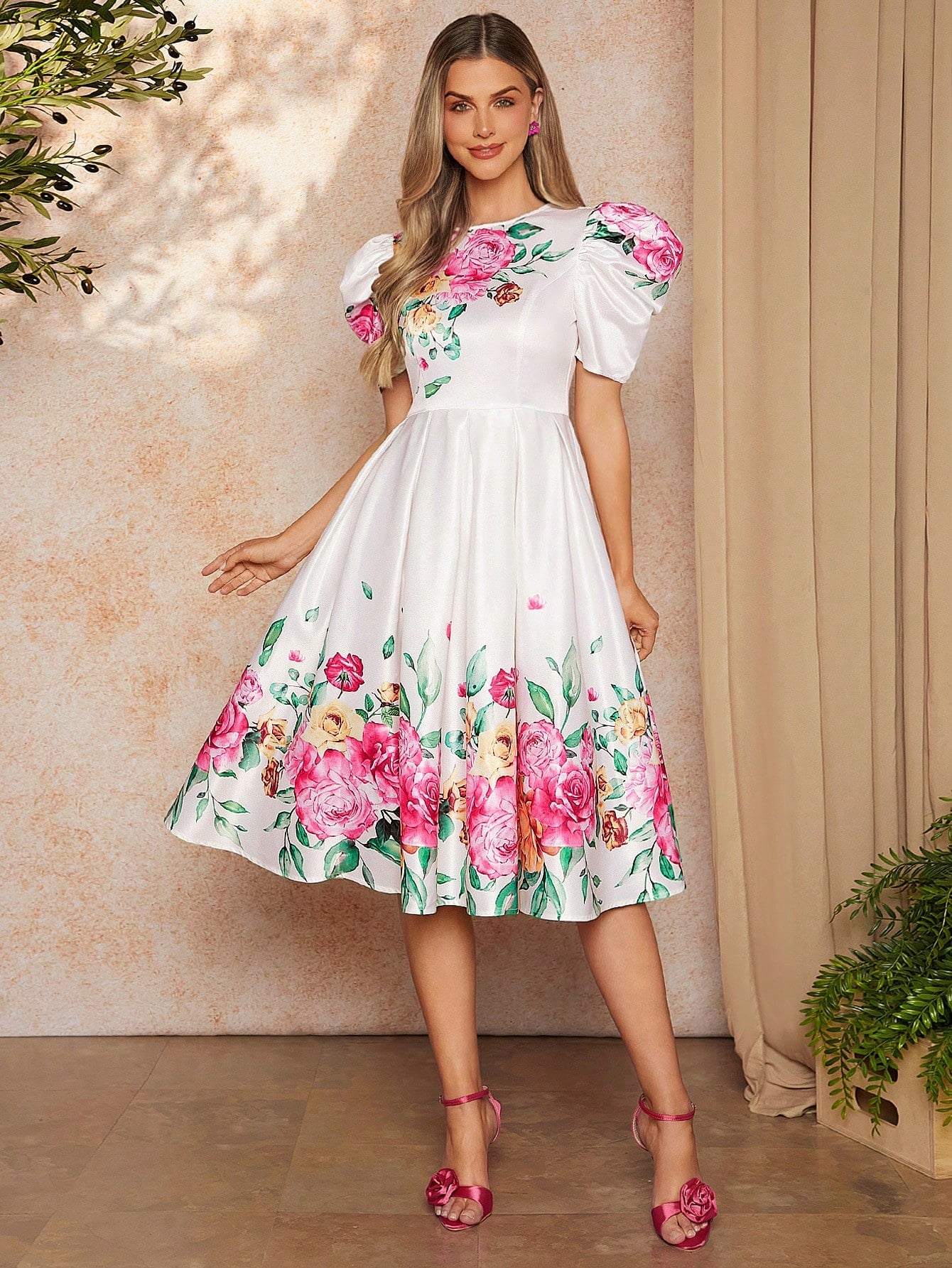 Get ready to turn heads in our Elegant Floral Gigot Sleeve Dress! With its beautiful floral design and unique gigot sleeves, this dress is perfect for any occasion. Dress it up or down for a versatile and stylish look. Say yes to feeling elegant and looking amazing!
