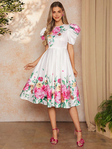 Get ready to turn heads in our Elegant Floral Gigot Sleeve Dress! With its beautiful floral design and unique gigot sleeves, this dress is perfect for any occasion. Dress it up or down for a versatile and stylish look. Say yes to feeling elegant and looking amazing!