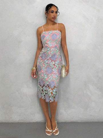 Elevate your wardrobe with this stunning floral guipure lace overlay cami dress. Featuring delicate embroidered details and an all-over botanical print, this knee-length piece combines elegance with versatility. The high-waist silhouette and spaghetti straps create a flattering, refined look perfect for beach outings, concerts, or festive celebrations. Crafted from 100% polyester with slight stretch for comfort, the lined bodice ensures a polished appearance. A convenient zipper closure adds practicality to