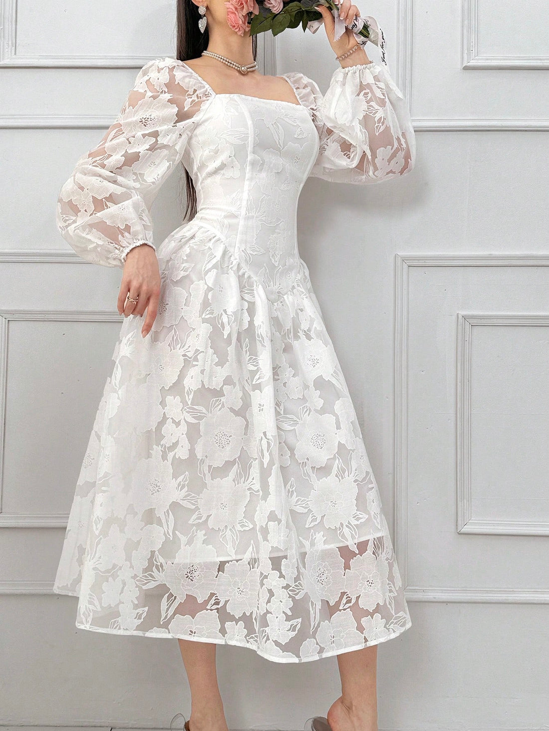 Step into style with this Elegant Floral Jacquard Dress, designed to turn heads wherever you go. Featuring a flattering square neckline and long sleeves, its mid-length cut strikes the perfect balance between chic and comfortable. The intricate floral jacquard pattern adds a touch of whimsy, making it ideal for any occasion where you want to feel effortlessly fabulous.