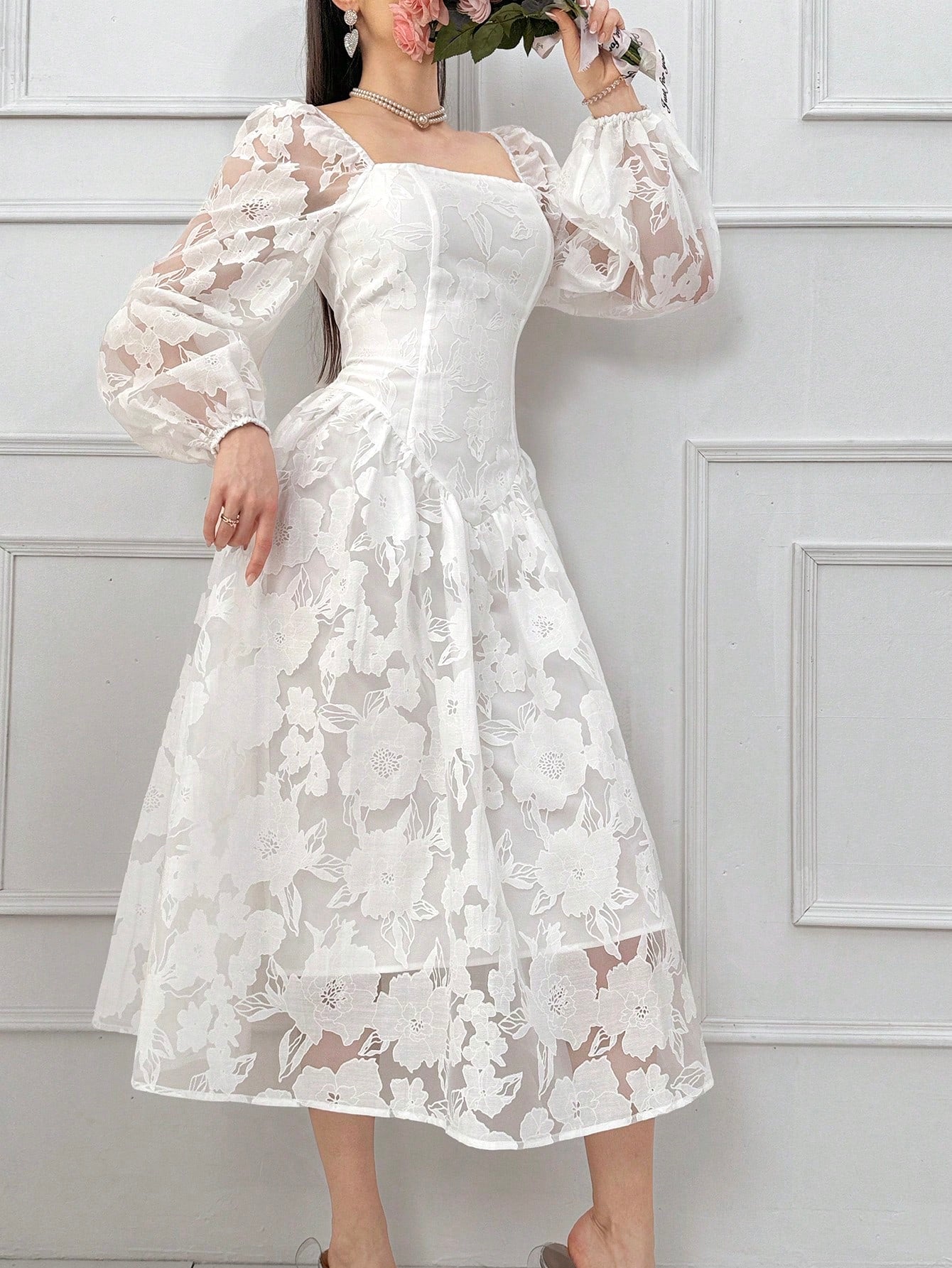 Step into style with this Elegant Floral Jacquard Dress, designed to turn heads wherever you go. Featuring a flattering square neckline and long sleeves, its mid-length cut strikes the perfect balance between chic and comfortable. The intricate floral jacquard pattern adds a touch of whimsy, making it ideal for any occasion where you want to feel effortlessly fabulous.