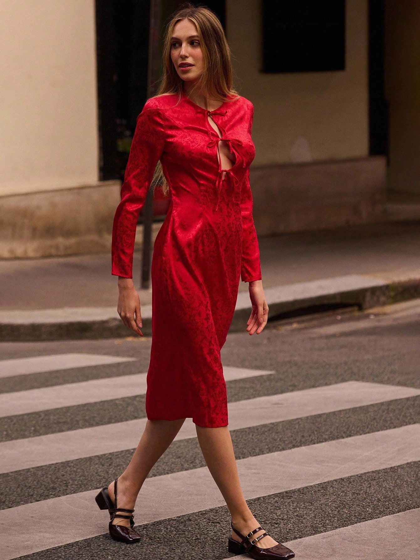 Elevate your seasonal wardrobe with this stunning floral jacquard midi dress—a playful twist on timeless elegance. The intricate jacquard weave brings texture and visual interest, while the charming triple tie detail at the waist adds a whimsical touch that flatters your silhouette. Perfect for fall and winter gatherings, from casual brunches to festive celebrations, this midi-length beauty strikes the ideal balance between sophisticated and fun. The rich floral patterns work beautifully with cooler-weather