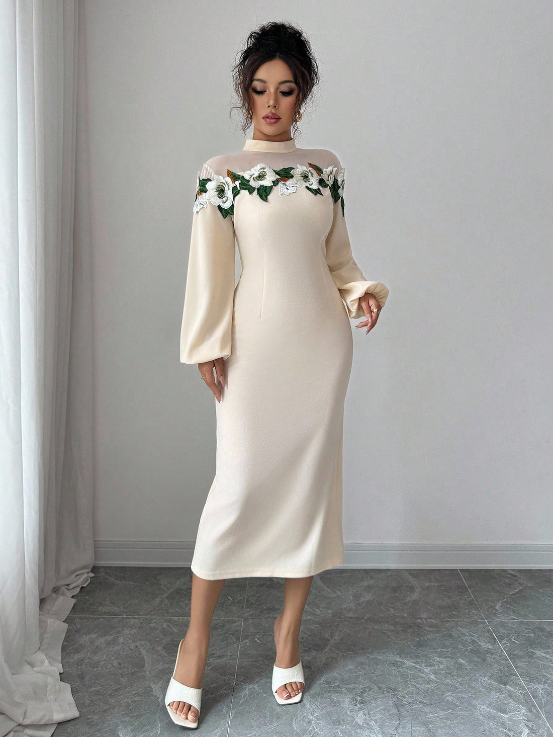 Slip into sophistication with this stunning floral lace bodycon dress that hugs your curves in all the right ways. Delicate lace detailing creates an enchanting, romantic vibe perfect for date nights, weddings, or any special occasion that calls for elegance. The fitted silhouette flatters your figure while the intricate floral patterns add a touch of whimsy and charm. Whether you're celebrating fall romance or turning heads at an evening event, this dress delivers timeless style with a playful edge. Pair w