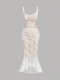 Experience the breathtaking fusion of heritage lace artistry and sharp, modern architectural tailoring. This stunning ruffle-hem ensemble is meticulously designed for the woman who values a high-fashion, 