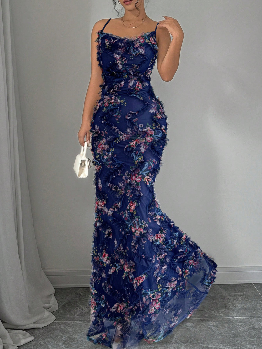 Elevate your style for special occasions with our Elegant Floral Mesh Evening Dress for Women. The luxurious design features a delicate floral mesh that adds a touch of elegance to your look. Perfect for any formal event, this dress will make you stand out in the crowd.