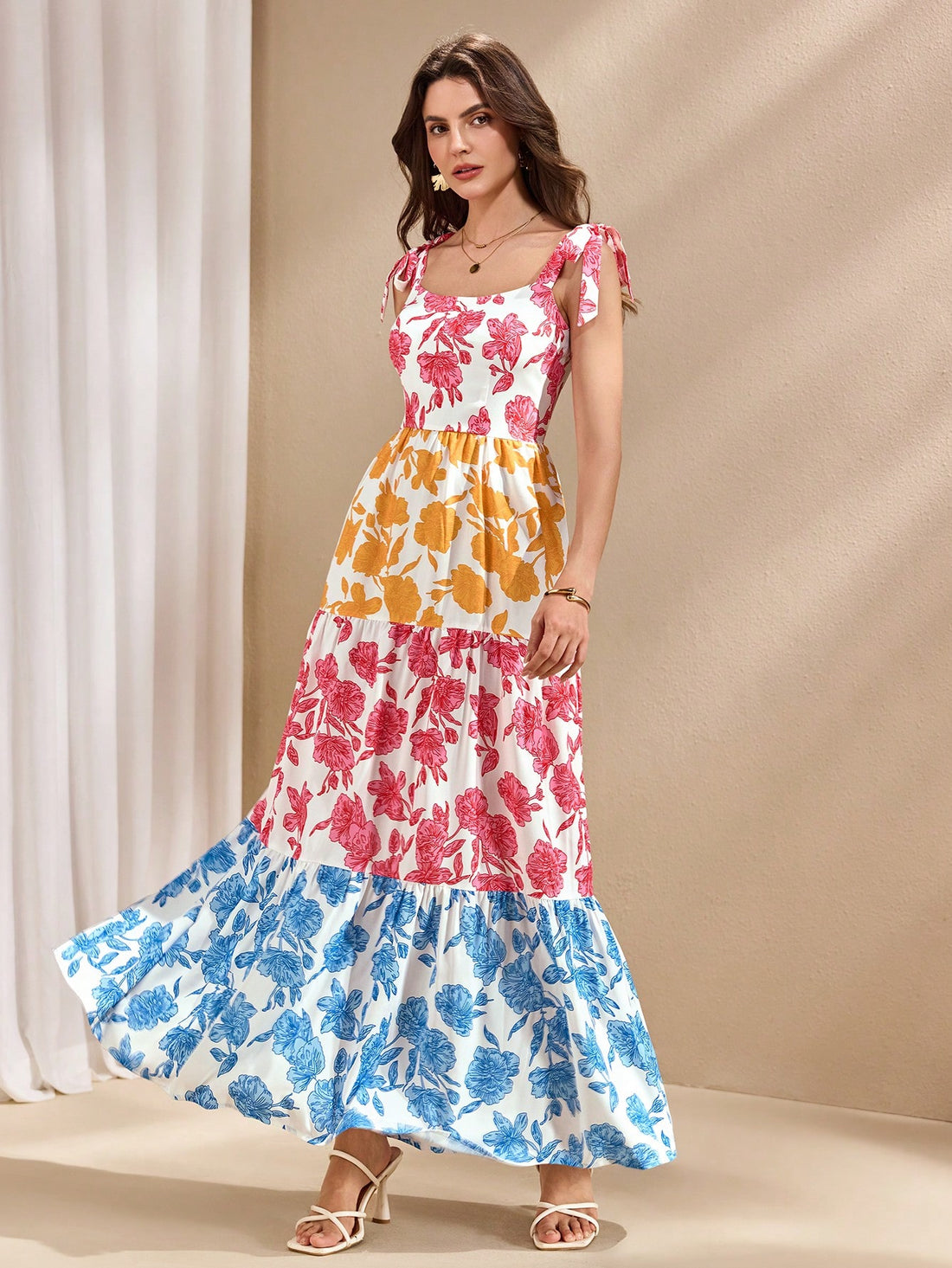 Escape to paradise in this charming floral patchwork dress that's practically begging for a vacation! Featuring a playful tiered hem that dances with every step, this piece combines romantic florals with modern patchwork details for effortless summer style. Perfect for beach getaways, garden parties, or lazy afternoons exploring new destinations. The flowing silhouette keeps you cool and comfortable while the mixed prints add personality and flair. Whether you're sipping cocktails by the pool or strolling t