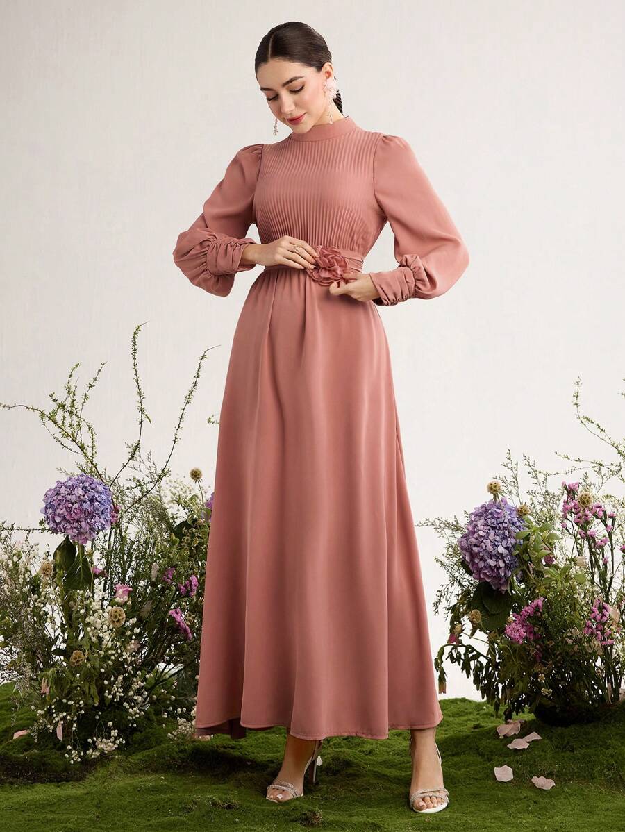 Step into effortless charm with this Elegant Floral Pleated Long Sleeve Dress. Its delicate floral print and flowing pleats bring a playful touch to your look, while the long sleeves add a hint of sophistication. Perfect for everything from brunch dates to garden parties, this dress lets you twirl through any occasion with grace and style.