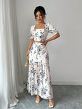 Bloom into effortless style with this charming 2-piece set! The short-sleeve floral shirt pairs perfectly with a graceful slit-hem skirt, creating a look that's equal parts vacation-ready and everyday fabulous. Whether you're sipping cocktails by the pool or running errands around town, this set delivers comfort and elegance in one gorgeous package. The vibrant floral print brings a fresh, feminine touch that works year-round. Mix, match, or wear together—this versatile duo is your new go-to for looking put