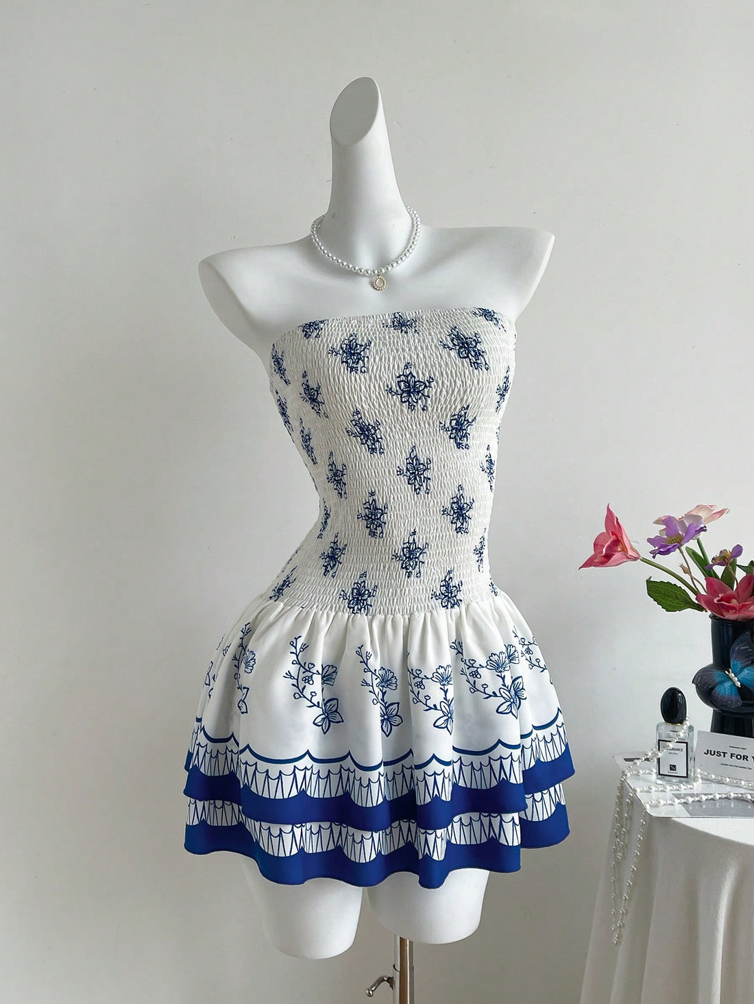 Turn heads on your next getaway with this Elegant Floral Print Bandeau Bodycon Dress. Its figure-hugging silhouette and vibrant floral pattern bring a fun, flirty vibe perfect for sunny days and warm nights. Easy to slip on and style, this dress is your go-to for effortless vacation chic.