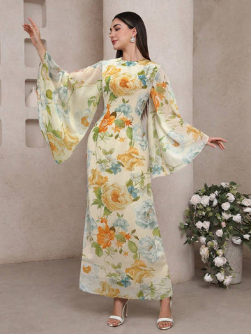 Step into style with this Elegant Floral Print Bell Sleeve Dress, designed to brighten any occasion. The playful bell sleeves add a whimsical touch, while the vibrant floral pattern brings a burst of cheerfulness. Perfect for brunches, garden parties, or casual days out, this dress combines comfort and charm effortlessly. Flowy and flattering, it’s your new go-to for capturing fun, feminine vibes wherever you go.