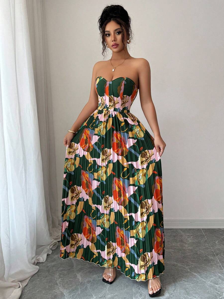 Step into romance with this stunning floral print bustier dress that's equal parts elegant and enchanting. The fitted bodice hugs your curves beautifully while the pleated A-line skirt flows with effortless grace, creating a silhouette that turns heads. Delicate florals dance across the fabric, bringing a touch of garden-inspired charm to any occasion. Perfect for date nights, garden parties, or whenever you want to feel absolutely fabulous. This dress proves that timeless style never goes out of fashion.