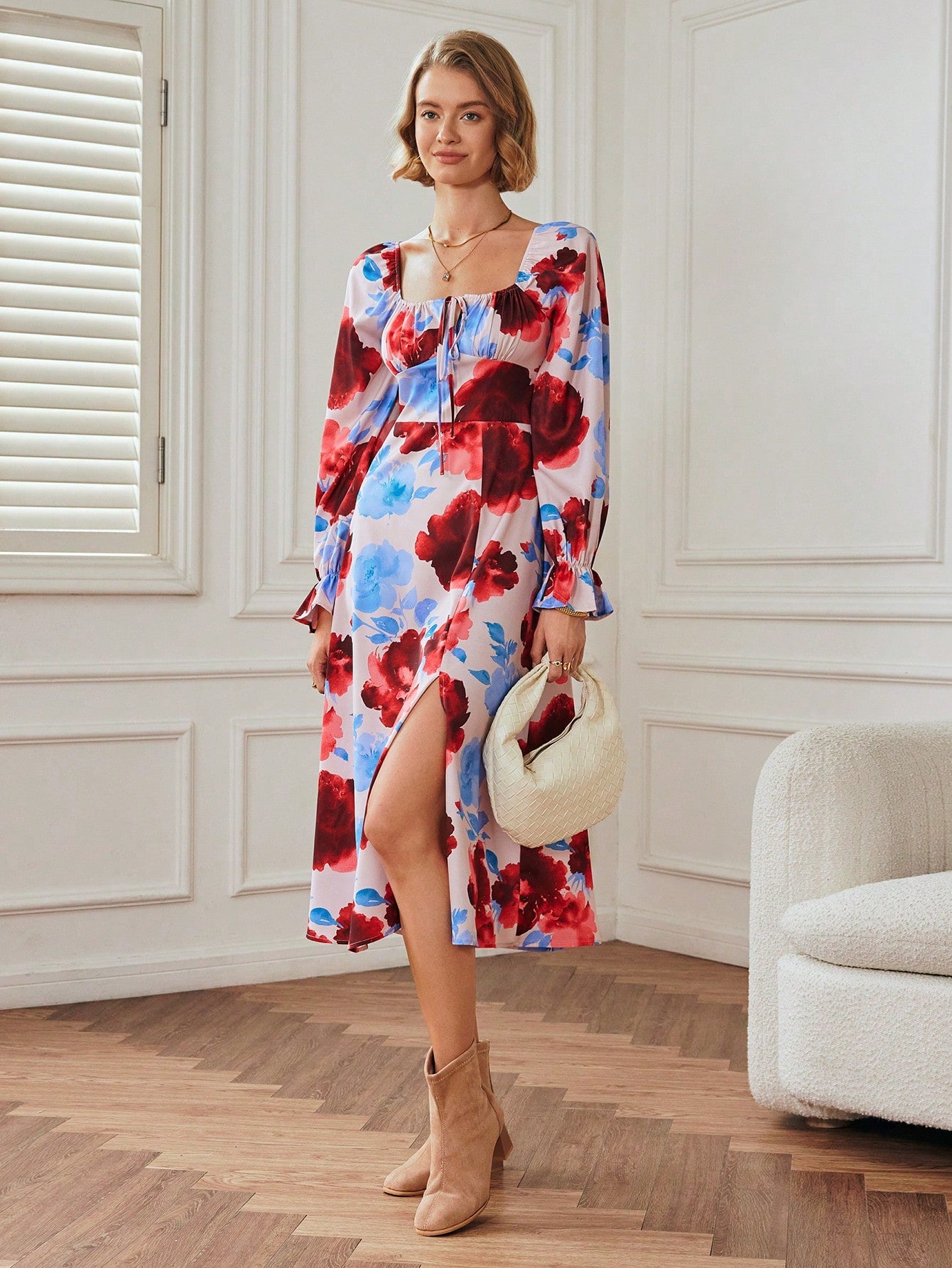 Make a statement with this elegant floral print high-neck dress for women. Featuring long sleeves and a side slit hem, this dress is perfect for any occasion. Stay stylish and comfortable at the same time!