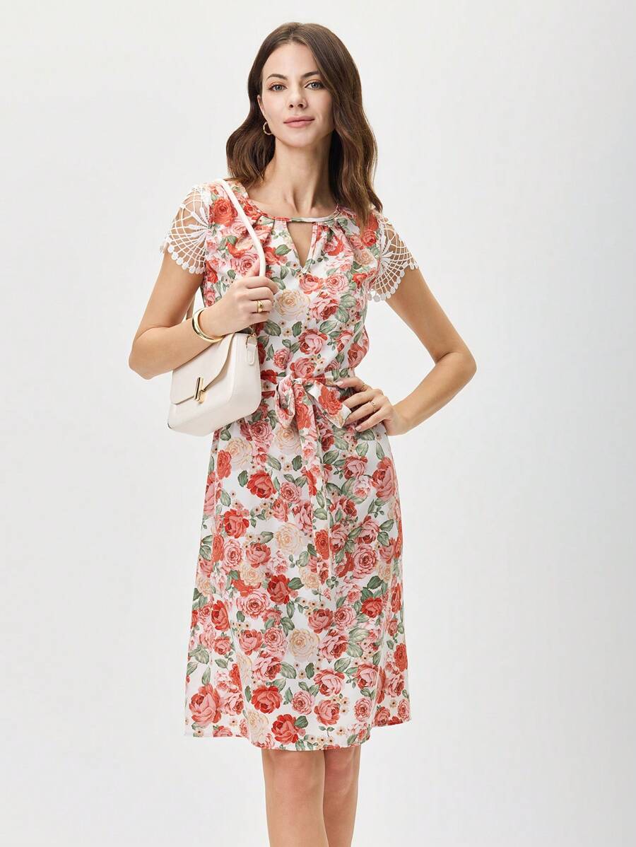 Be the epitome of elegance and fun in our Floral Print Keyhole Neckline Dress! This dress features a delicate keyhole neckline, contrast lace detailing, and a flattering waist belt. Perfect for any occasion, it will keep you stylish and comfortable all day long.