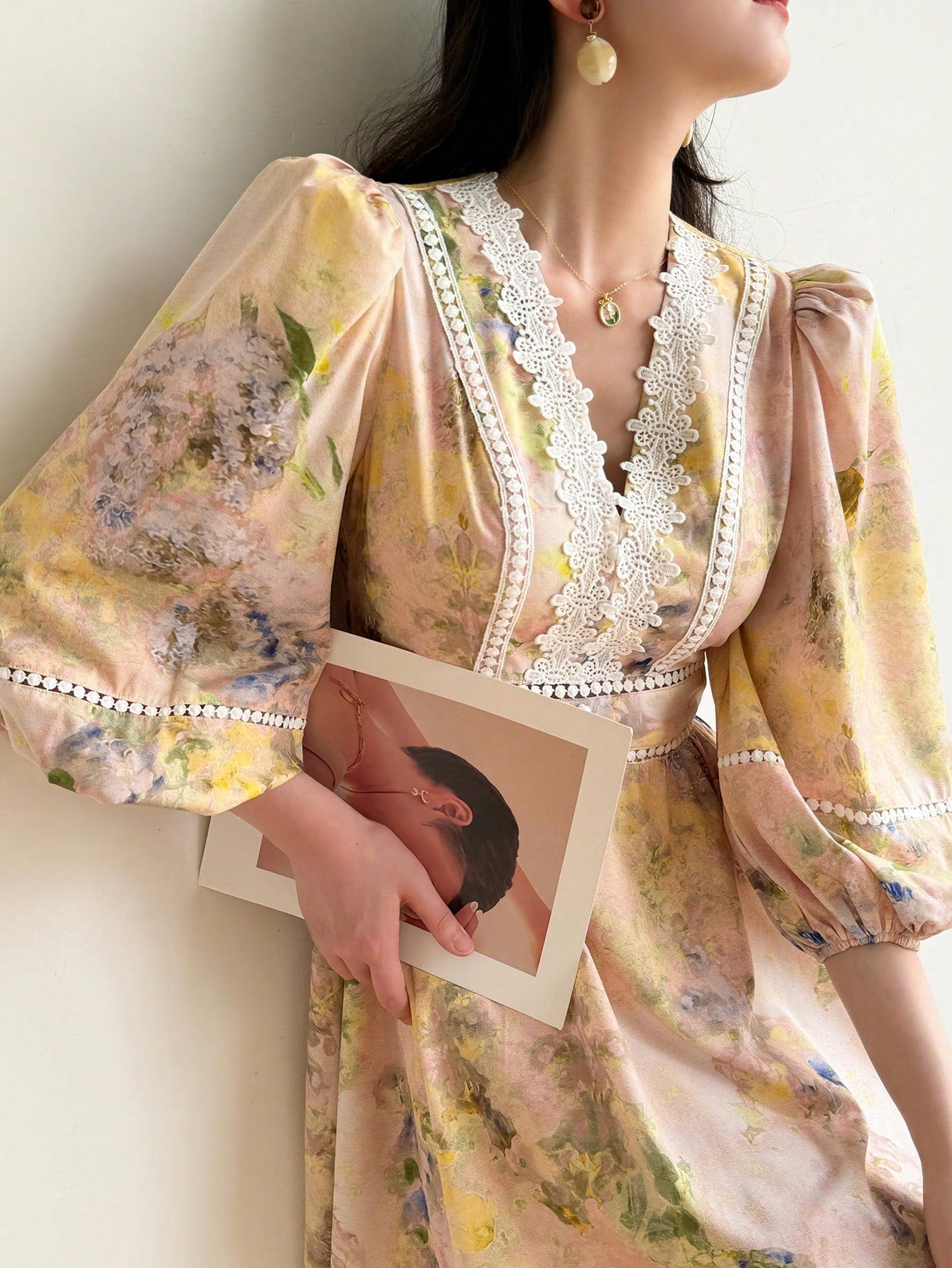 Step into holiday charm with this Elegant Floral Print Lantern Sleeve Dress. Featuring delicate lace trim and whimsical lantern sleeves, it brings a playful touch to your festive wardrobe. The vibrant floral pattern adds a burst of color, perfect for celebrations and sunny gatherings alike. Comfortable and stylish, this dress lets you dance through the season with effortless grace.