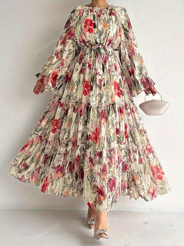 Twirl into elegance with our Floral Print Lantern Sleeve Dress! This Arabic-inspired beauty combines whimsical lantern sleeves with a flirty ruffle hem that dances with your every move. The charming floral pattern adds just the right amount of fun to your wardrobe, making it perfect for turning heads and collecting compliments wherever you go!