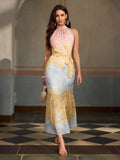 Step into sunshine with this Elegant Floral Print Maxi Beach Dress. Its breezy halter neck design keeps you cool while flaunting your shoulders, perfect for carefree beach days or sunset strolls. The flowing maxi length and vibrant floral pattern bring instant holiday vibes, making every moment feel like a stylish getaway. Slip it on and let the playful spirit of summer follow you wherever you go!