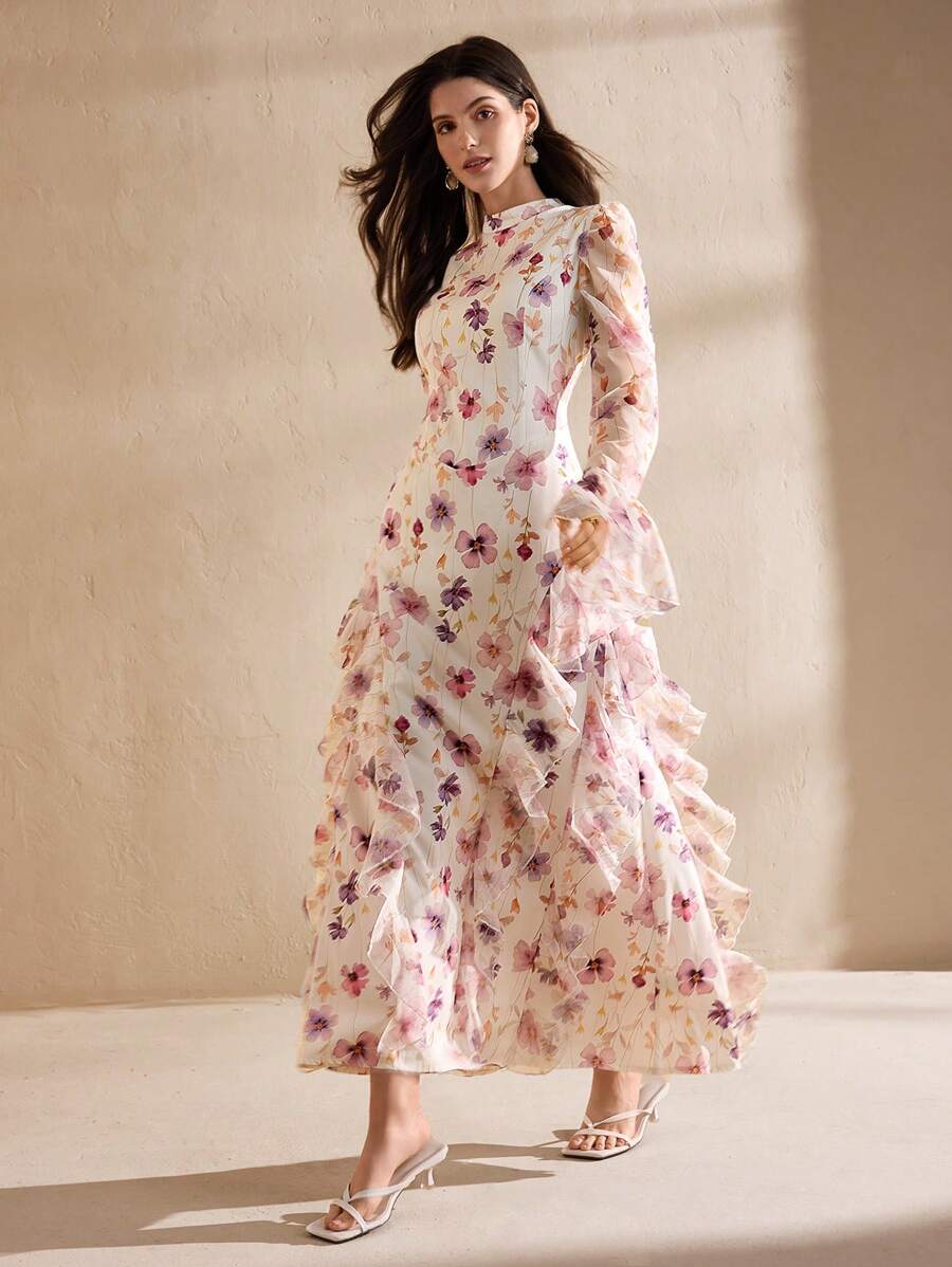 Step into summer with this Elegant Floral Print Maxi Dress! Featuring a flounced hem that catches the breeze and a tie waist that lets you flatter your figure just right, this dress combines comfort with playful charm. Whether you're strolling through a garden or headed to a brunch, its vibrant floral pattern keeps your style effortlessly fresh and fun. Perfect for warm days when you want to feel breezy, feminine, and ready for anything.