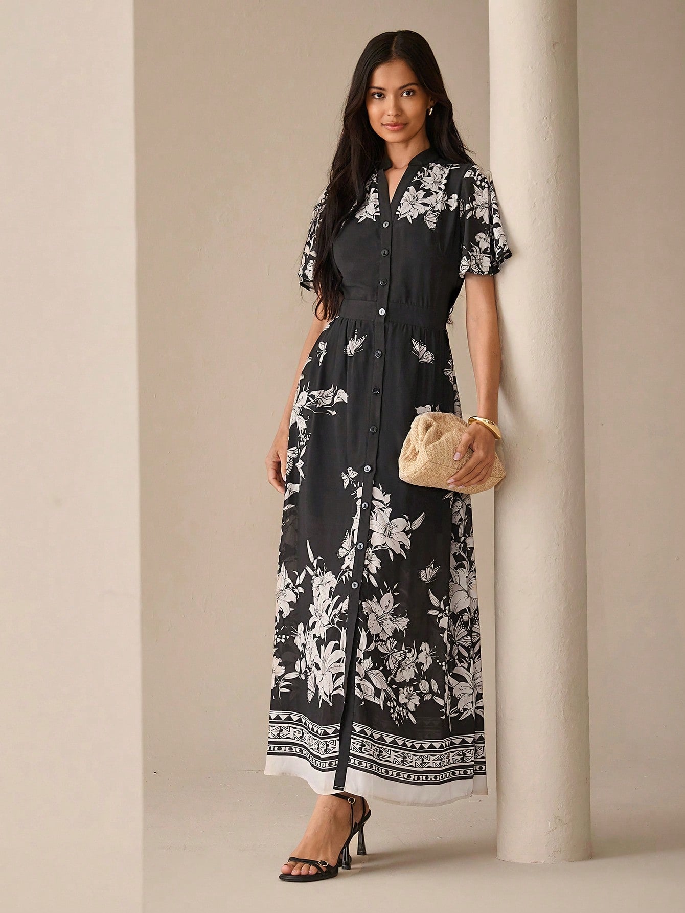 Step into summer with this playful floral print maxi dress, featuring a chic notched neck and button-front design. Its flowing silhouette keeps you cool and comfortable, perfect for sunny outings or garden parties. Embrace effortless style and let your vibrant personality bloom wherever you go.