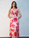 Step into the holiday spotlight with this Elegant Floral Print Maxi Halter Dress designed just for festive fun. Flowing fabric and a graceful halter neckline combine comfort with charm, making it your go-to choice for Christmas and New Year's celebrations. Bright florals and a flattering maxi length add just the right touch of whimsy to keep you dancing all night long. Celebrate in style and let your festive spirit bloom!
