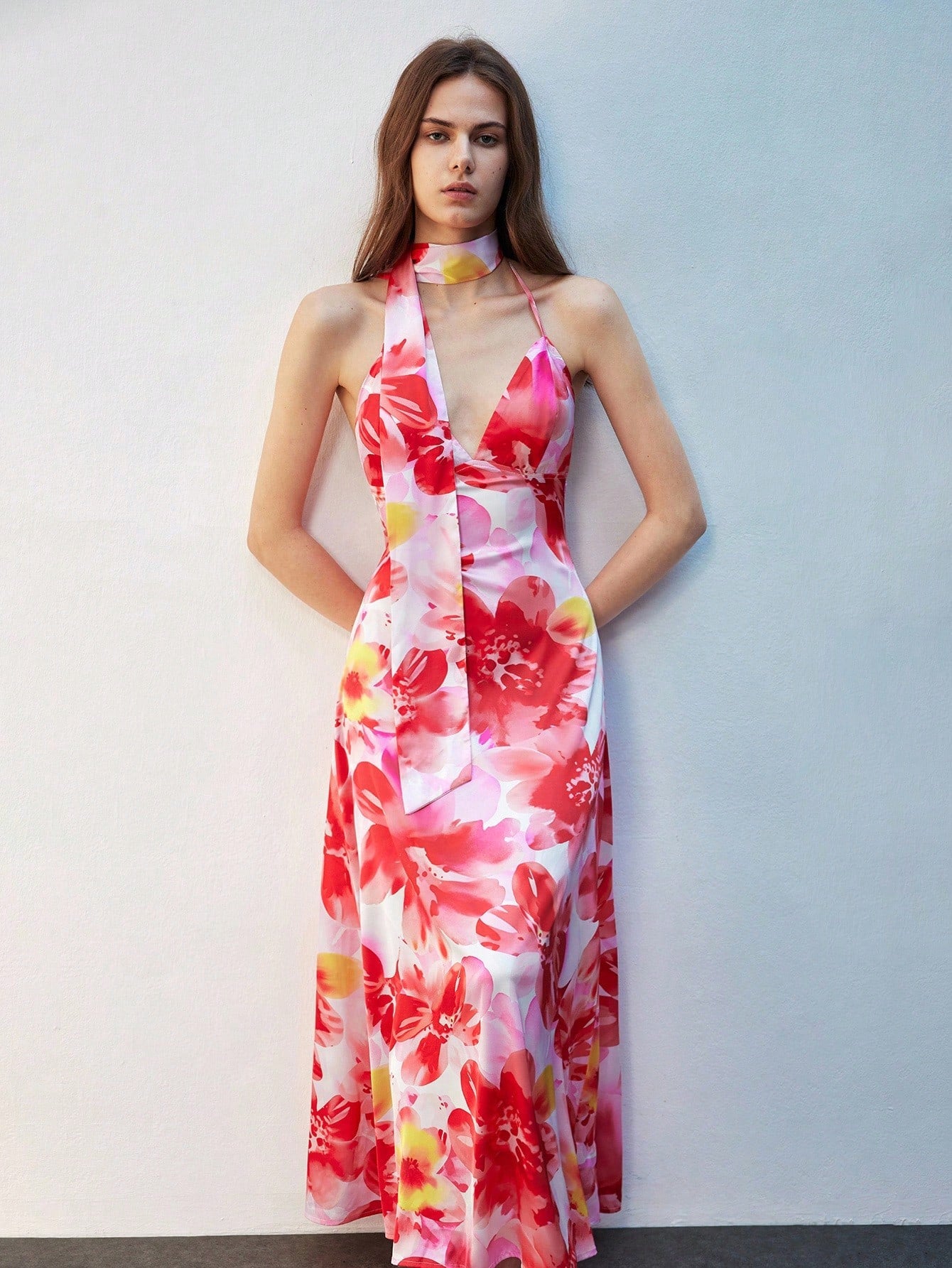 Step into the holiday spotlight with this Elegant Floral Print Maxi Halter Dress designed just for festive fun. Flowing fabric and a graceful halter neckline combine comfort with charm, making it your go-to choice for Christmas and New Year's celebrations. Bright florals and a flattering maxi length add just the right touch of whimsy to keep you dancing all night long. Celebrate in style and let your festive spirit bloom!