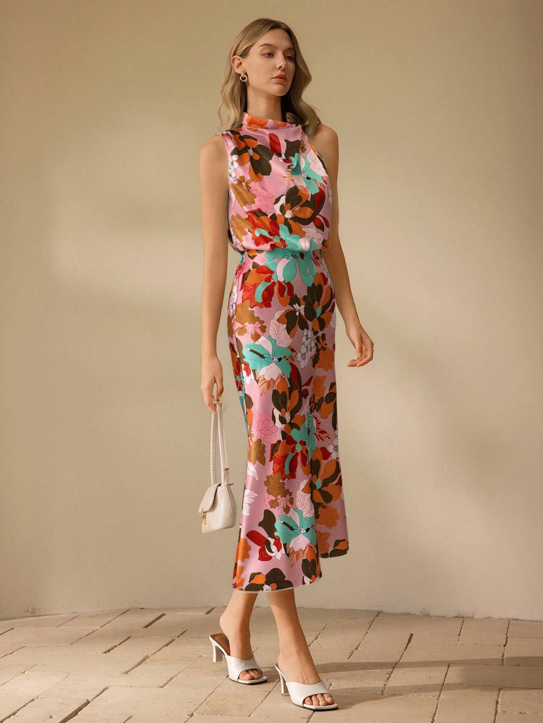 Add a touch of elegance to any occasion with our Floral Print Midi Dress for Women. Featuring a beautiful floral print, this dress is perfect for any event. Look and feel your best in this stylish and versatile piece. Perfect for any occasion!