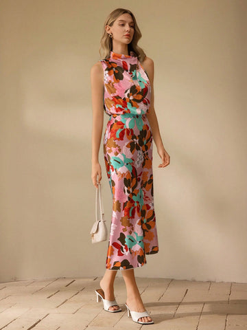 Add a touch of elegance to any occasion with our Floral Print Midi Dress for Women. Featuring a beautiful floral print, this dress is perfect for any event. Look and feel your best in this stylish and versatile piece. Perfect for any occasion!