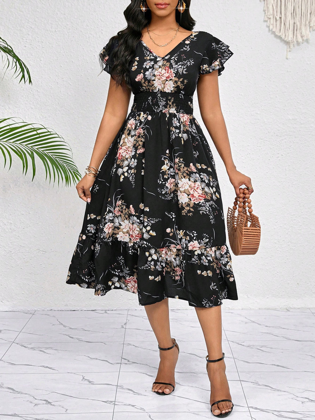 Get ready to turn heads with our Elegant Floral Print Midi Dress! This dress features a stunning floral print with ruffle trim and a matching belt, making it the perfect choice for any occasion. You'll feel effortlessly chic and confident, no matter where you wear it. Say yes to stylish versatility with this dress.