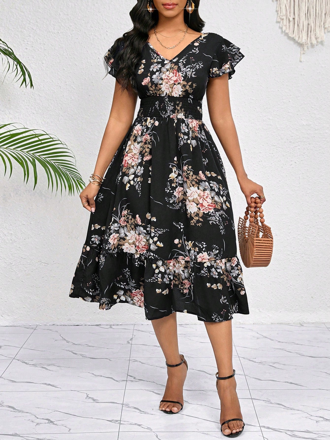 Get ready to turn heads with our Elegant Floral Print Midi Dress! This dress features a stunning floral print with ruffle trim and a matching belt, making it the perfect choice for any occasion. You'll feel effortlessly chic and confident, no matter where you wear it. Say yes to stylish versatility with this dress.