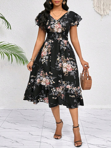 Get ready to turn heads with our Elegant Floral Print Midi Dress! This dress features a stunning floral print with ruffle trim and a matching belt, making it the perfect choice for any occasion. You'll feel effortlessly chic and confident, no matter where you wear it. Say yes to stylish versatility with this dress.