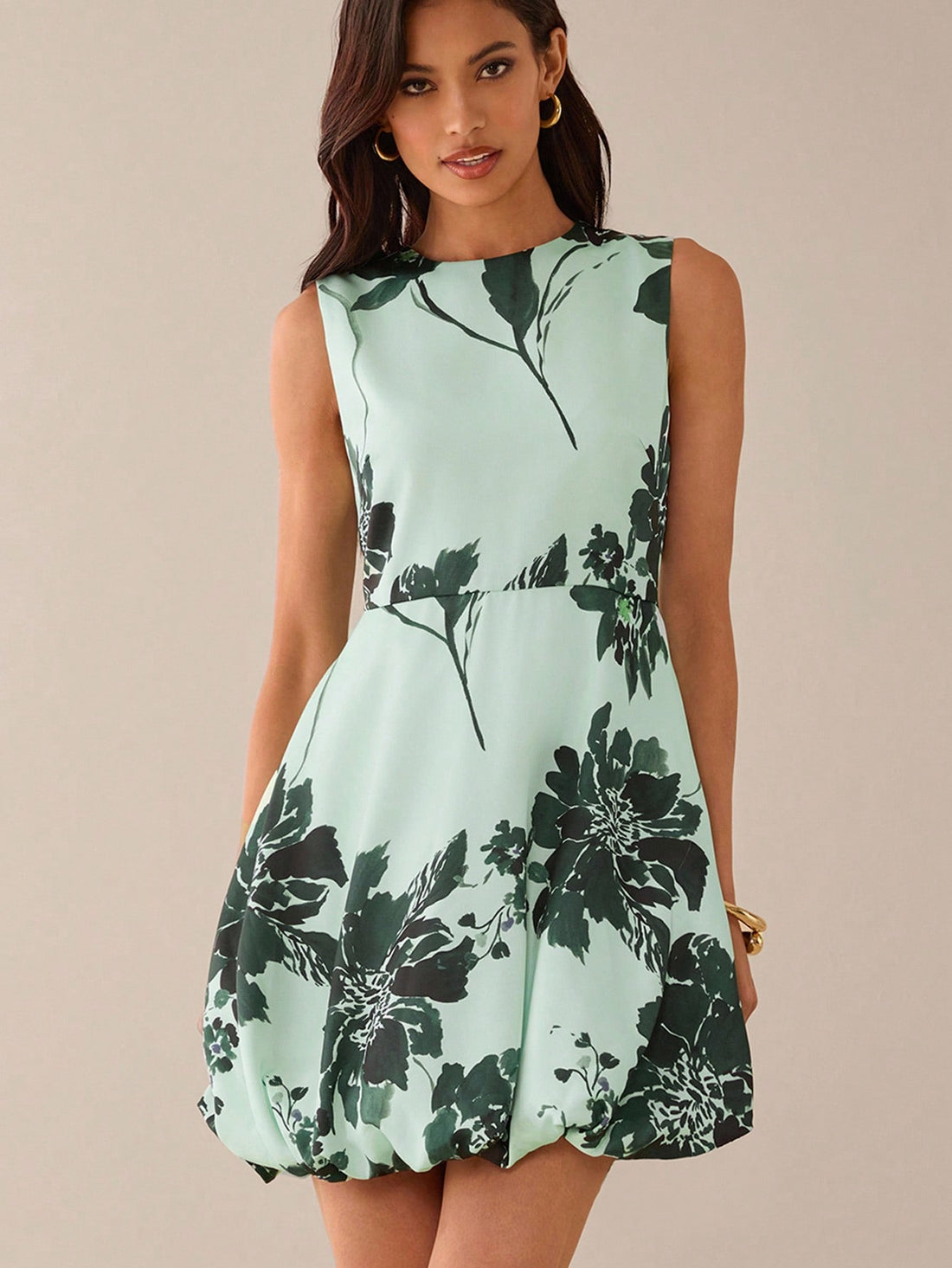 Step into sunny days with this Elegant Floral Print Mini Dress, designed to keep you cool and charming. Its sleeveless cut and lively floral pattern make it perfect for romantic summer outings, adding a dash of fun and flirty flair to your wardrobe. Light, breezy, and effortlessly stylish, this mini dress invites you to twirl through warm evenings with confidence and grace.