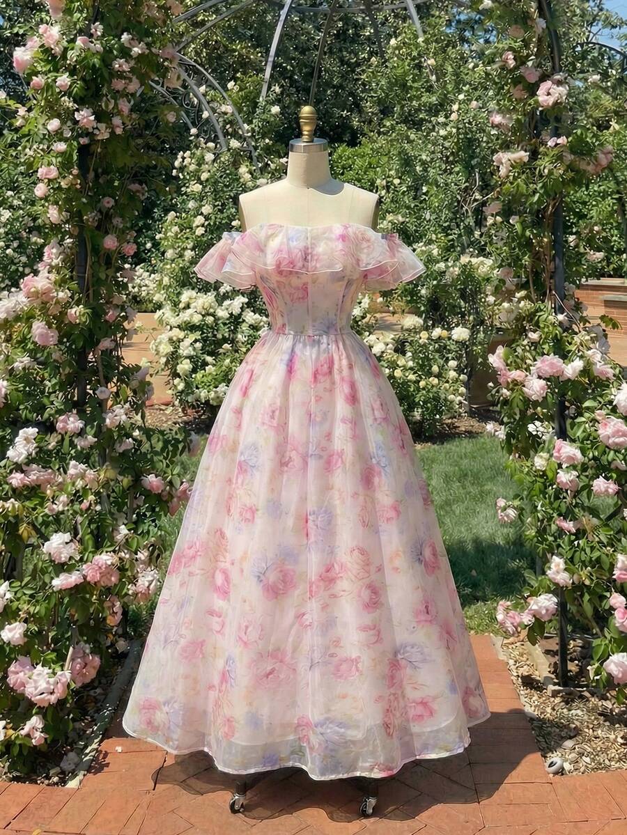 Elevate your spring and summer wardrobe with this stunning floral print off-shoulder dress. Featuring a romantic boho aesthetic, the dress showcases a flattering A-line silhouette with a high waist and flared hem that moves beautifully with every step. The off-shoulder neckline and delicate puff sleeves create an effortlessly elegant look, while shirred detailing adds texture and dimension. A backless design with zipper closure offers modern sophistication