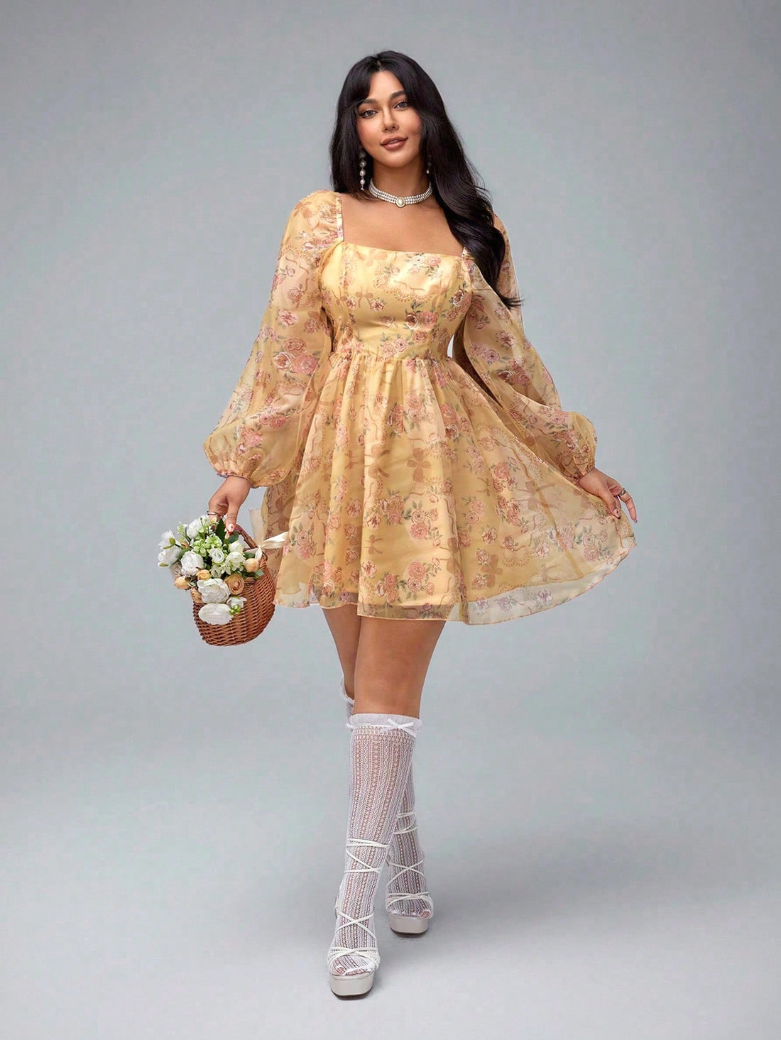 Step into spring and summer with this Elegant Floral Print Plus Size Organza Dress. Its airy organza fabric and charming lantern sleeves bring a whimsical touch perfect for sunny vacations. The playful floral pattern brightens your look while the flattering plus size fit ensures comfort and confidence wherever you go. Feel effortlessly stylish and ready for any sunny adventure!