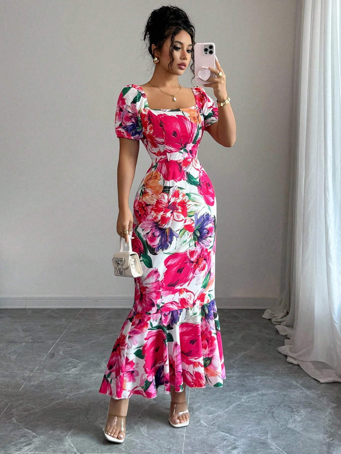 Twirl into any occasion in this show-stopping floral print dress! The charming puff sleeves add a touch of whimsy, while the square neckline frames your face beautifully. A graceful fishtail hem creates movement and elegance with every step. Perfect for lazy beach days, resort getaways, or casual outings where you want to look effortlessly chic. This versatile piece transitions seamlessly from day to night, making it your new go-to for any adventure that calls for a little extra flair.