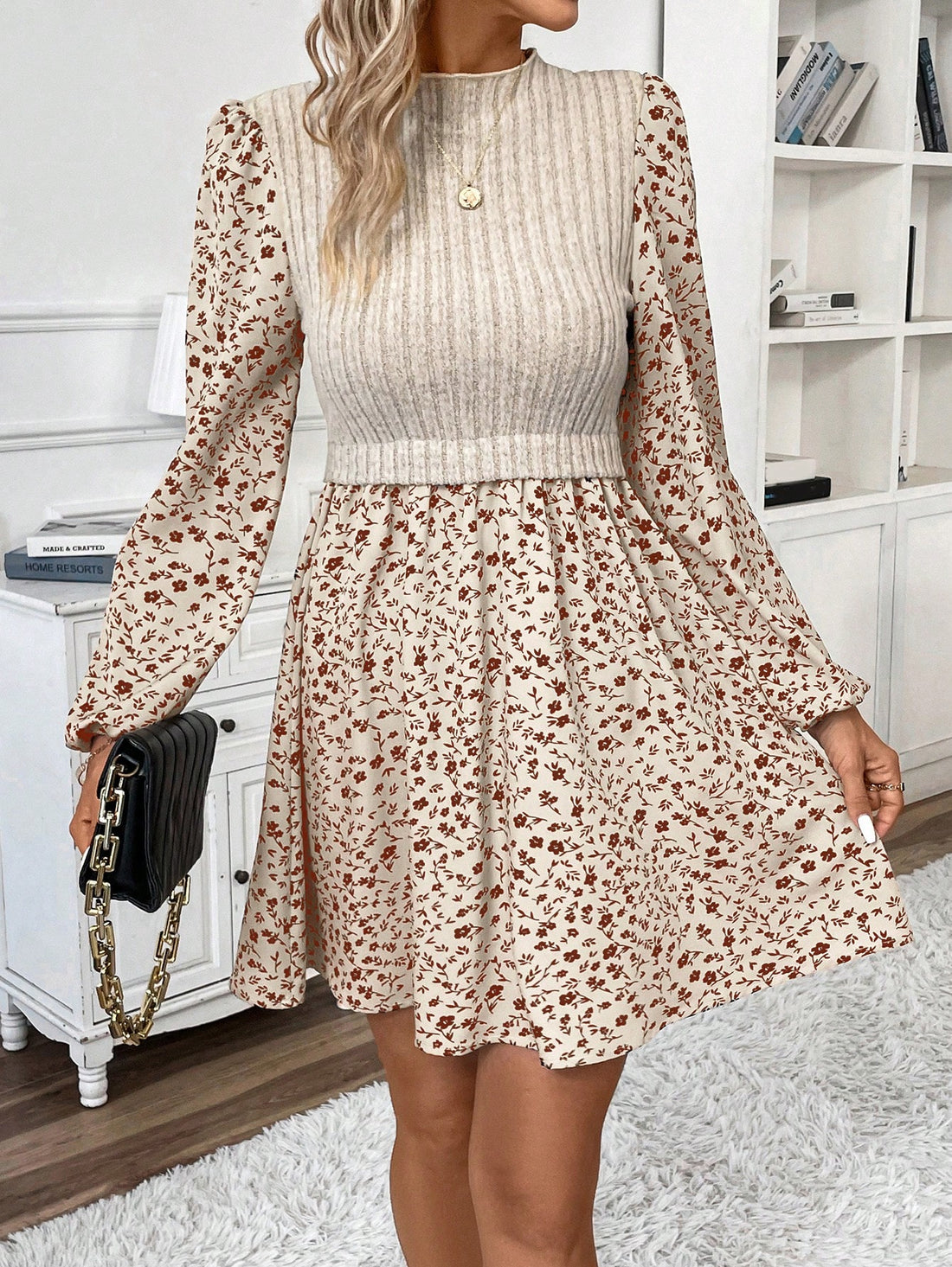 This elegant floral print ribbed stand collar dress for women combines stylish design with comfortable material. Perfect for formal or casual occasions, this dress features a unique floral print and a ribbed stand collar. Elevate your wardrobe with this must-have dress.