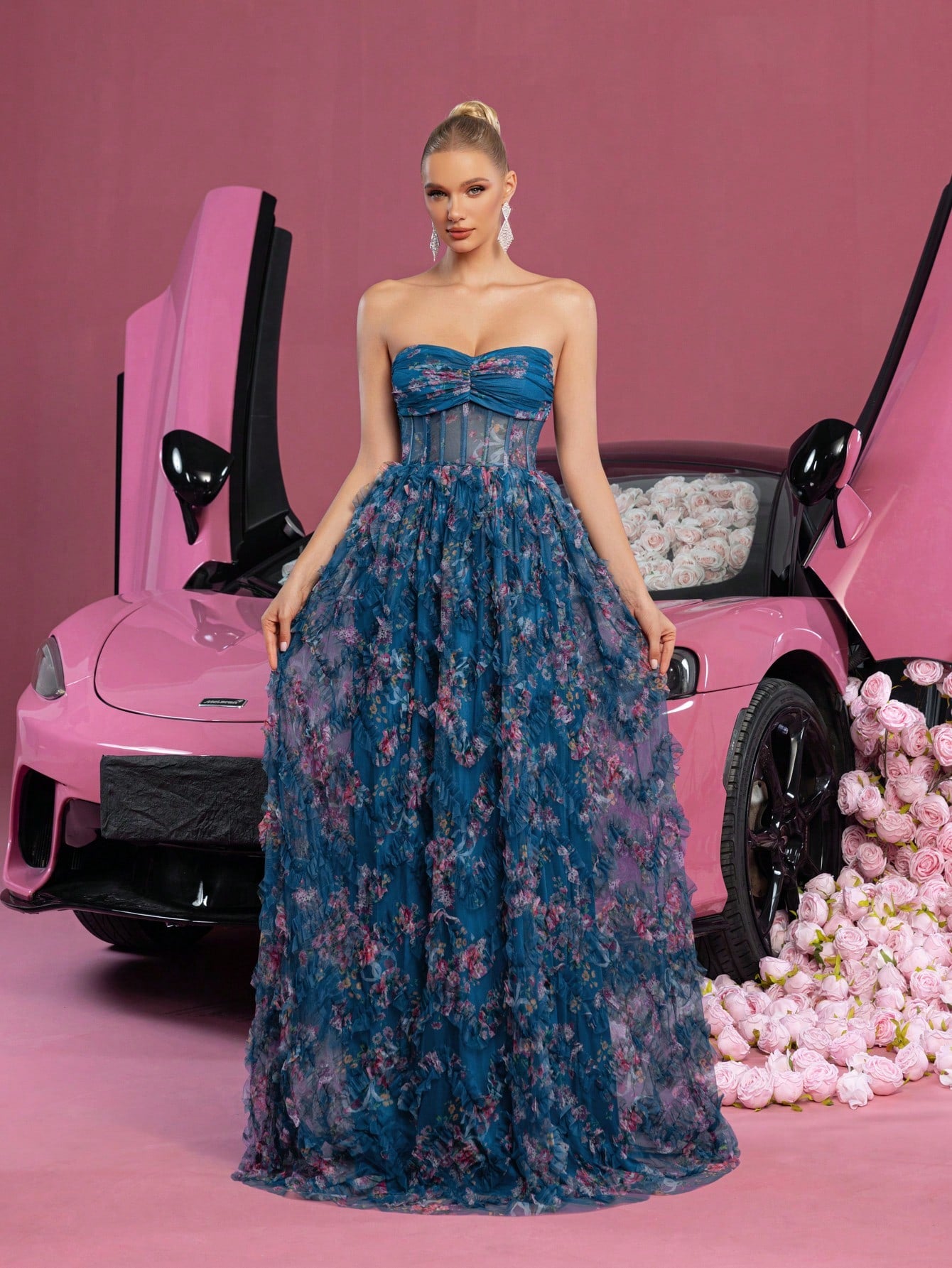 Step into the spotlight with this Elegant Floral Print Ruched Bustier Tube Dress. The playful ruching sculpts your silhouette, while the charming ruffle hem adds a flirty finish perfect for weddings and formal events. Effortlessly chic, this dress brings floral fun with a touch of sophistication to your special day.