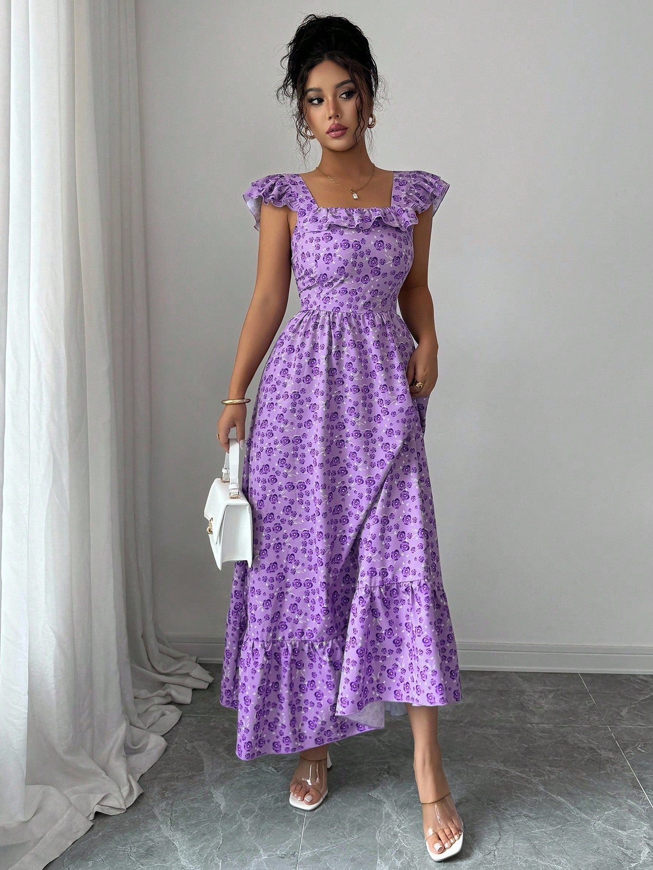 Step into the spotlight with this Elegant Floral Print Dress, featuring a charming ruffle hem that adds a flirty twist to your look. Perfect for homecoming or any special occasion, its vibrant floral pattern brings a burst of joy and style. Feel confident and playful as you dance the night away in this effortlessly chic dress designed to make every moment memorable.
