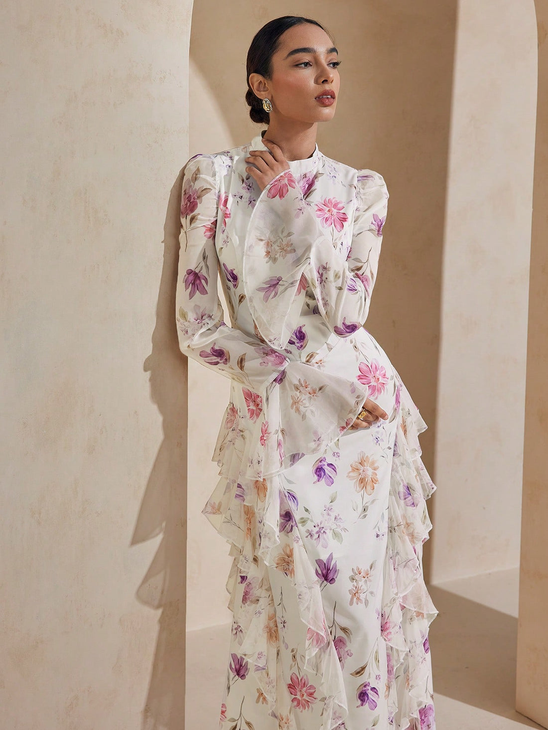 Step into charm with this Elegant Floral Print Dress, featuring a playful ruffle hem that dances with every step. The tied waist lets you create the perfect silhouette while keeping your look modest and effortlessly stylish. Whether it’s brunch or a garden party, this dress brings fresh, floral fun to your wardrobe.